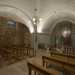...offre la curiosa visione del prolungamento murario non intonacato della chiesa sovrastante